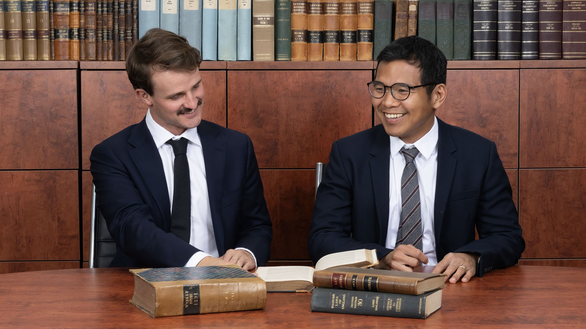 2 lawyers discussing legal matters